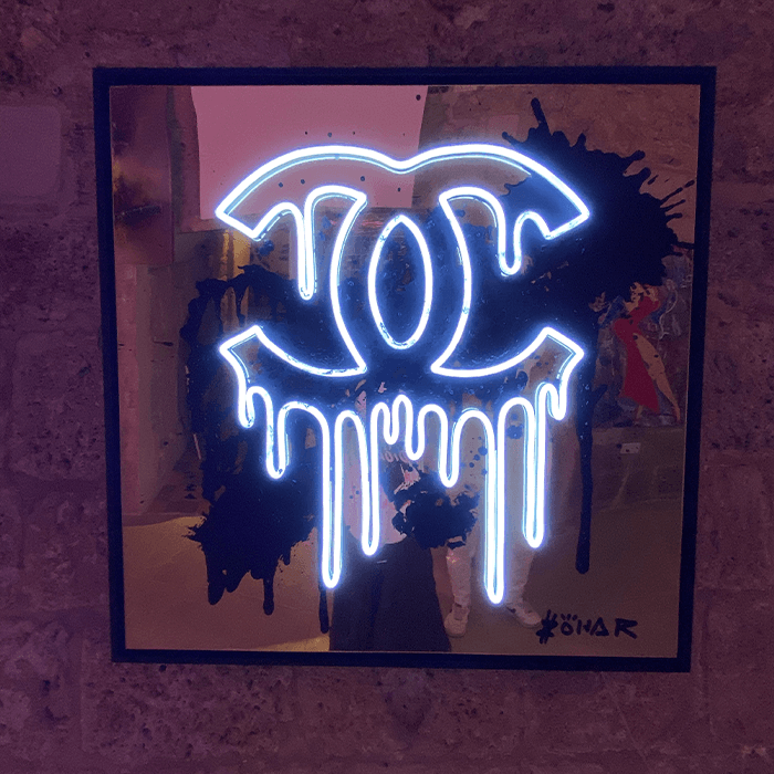 White Dripping Chanel on Gold Mirror