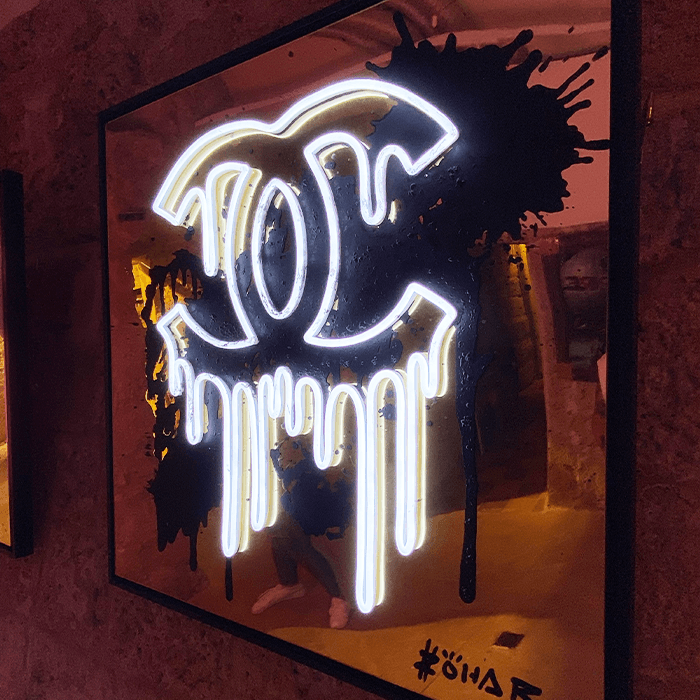 White Dripping Chanel on Gold Mirror